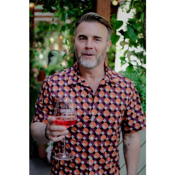 Gary Barlow with his wine glass